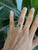 A natural pink sapphire glows in a soft, romantic pink at the centre of this solid 14K yellow gold ring, cut as a heart...