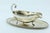 Silver Sauce Boat and Plate with Friezes and Applications, in Very Good conditions. Designed 1920 to 1949 This piece has...