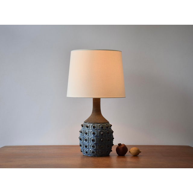 Mid-century Danish ceramic table lamp by Jette Hellerøe for the ceramic workshop Axella. Made circa 1970s. The base is...