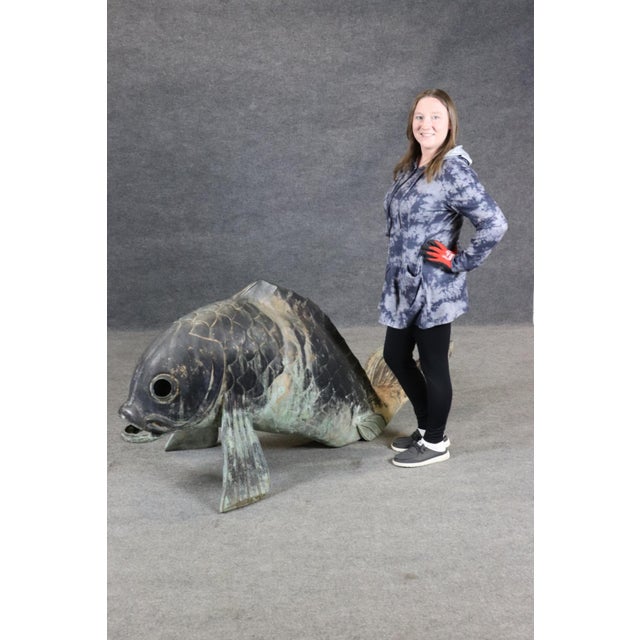 This monumental Japanese-style bronze fish sculpture is an extraordinary decorative work that captures both the natural...