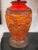 A great pair of vintage ceramic lamps in a Lava Glaze. Bright orange and red, these have just been re-wired with new...