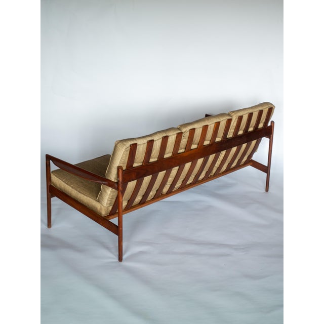Vintage Ib Kofod Larsen for Selig sofa, three-seat picket back design. This is a less common Risom form, with a walnut...