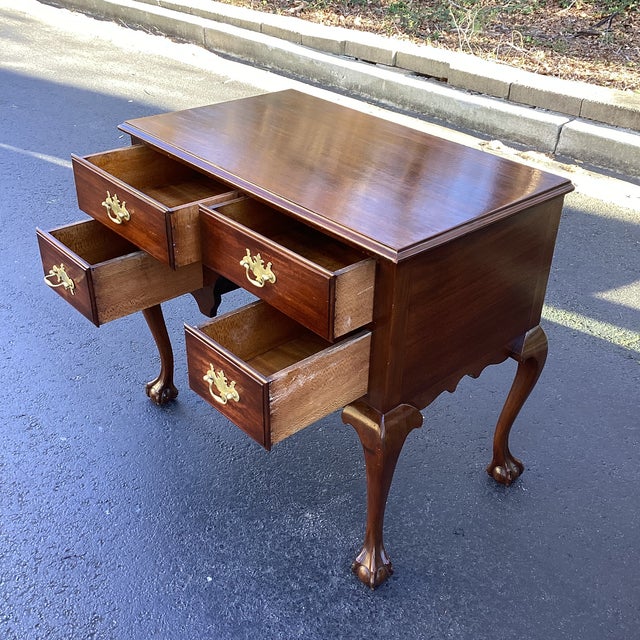 A classic Georgian-style mahogany lowboy or dressing table, beautifully proportioned and raised on elegant cabriole legs...