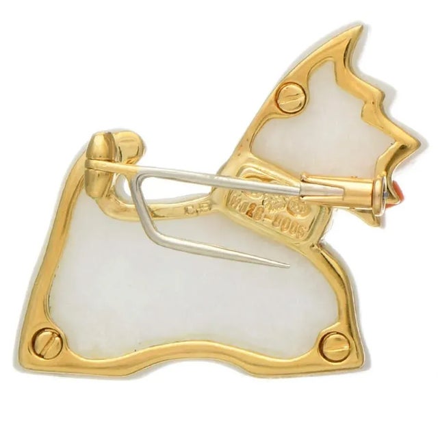 Exhibit the style of a top dog with this ornate and sophisticated Jadeite and diamond Scottie pin. It's eloquently adorned...