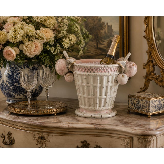 A lovely Mid-Century Italian blush pink and white majolica faux bamboo & fruit wine cooler champagne ice bucket, circa...