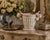 A lovely Mid-Century Italian blush pink and white majolica faux bamboo & fruit wine cooler champagne ice bucket, circa...