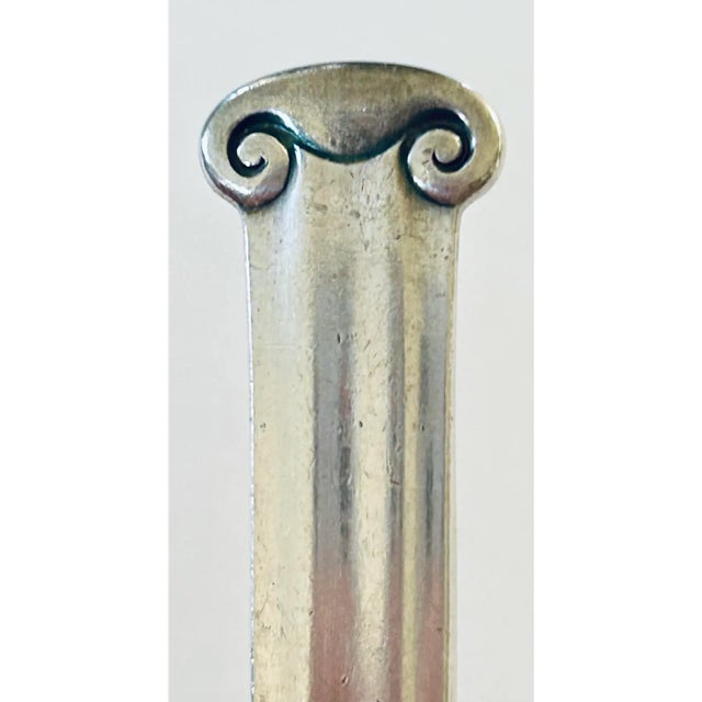 1935 Wallace Art Deco pattern Vogue II silver-plated flatware set. The spoons have the Art Deco style where the handle...