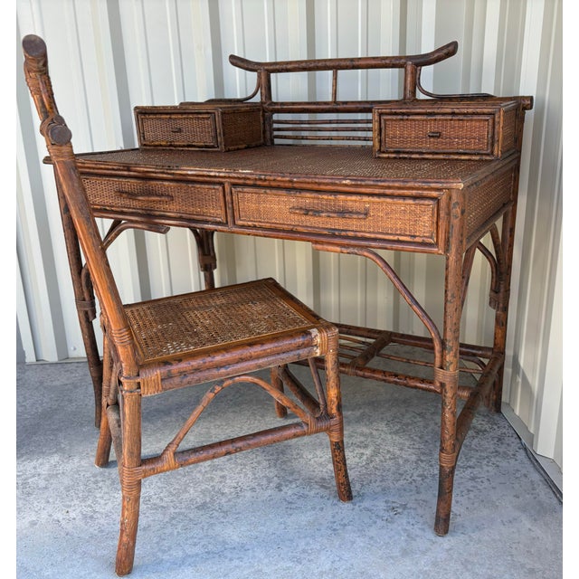 Dramatic pagoda style desk and chair made from faux burnt bamboo and grasscloth. This is a lovely and unique writing desk...