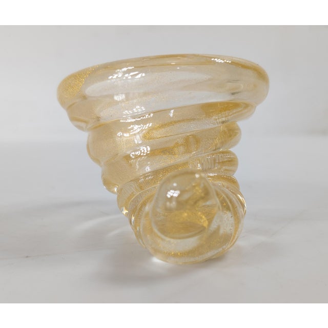 We are selling this pretty little Mid-Century Italian Murano glass piece. This glass piece is in the form of a cornucopia...