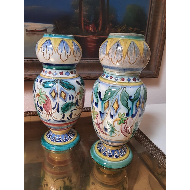 Gorgeous pair of Deruta Majolica Italian vases. Deruta pottery is celebrated for its beauty and craftsmanship, having been...