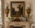 An exceptional pair of Italian neoclassical wall sconce shelves by Borghese, richly carved with foliate swags, fluted...