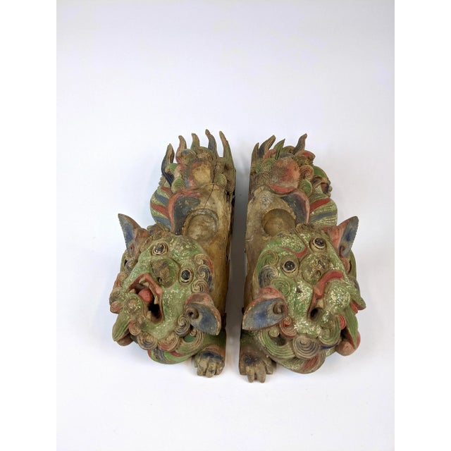 These foo dogs have the best expressions! These hand carved and painted foo dogs were decorative elements from a temple....