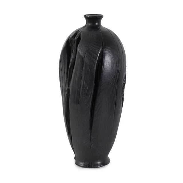 A captivating blend of nature's rugged beauty and contemporary design. This remarkable vase has been meticulously crafted...