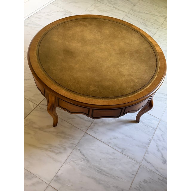 Beautiful Mid-Century Weiman "Heirloom Quality" Round French Provincial Coffee Table With Gold-Tooled Leather Top. Item...