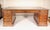 Antique George III style mahogany partners desk with leather top, 19th century. With an inset tooled green leather top,...