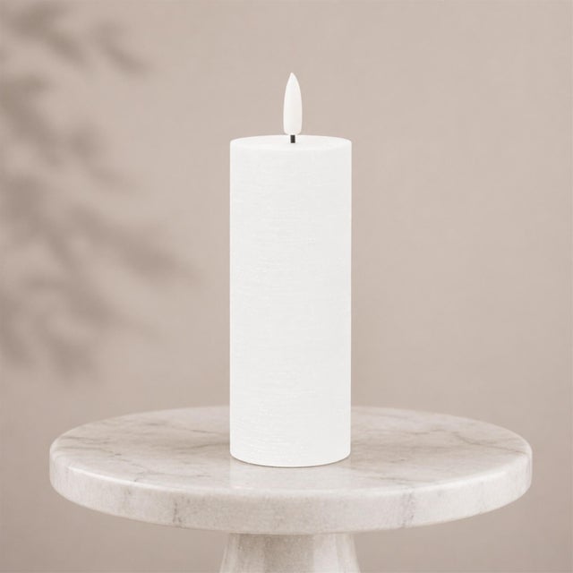 Illuminate your home with the elegant FIA Wick White Pillar Candles. Featuring FIA Wick technology, these candles offer...