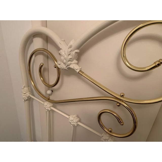 Beautiful Heirloom quality painted iron and brass headboard is a vintage reproduction of a classic antique iron bed...