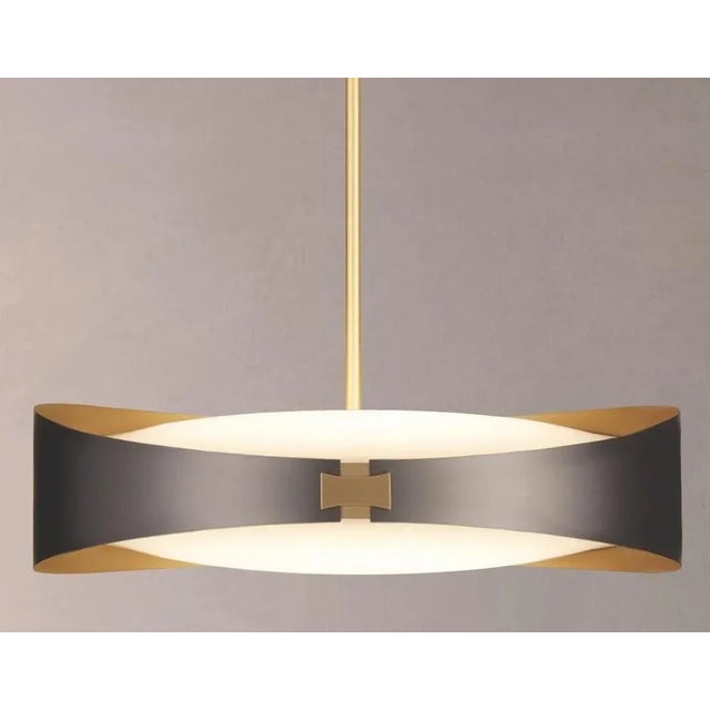 Ring pendant by emilie cathelineau dimensions: d50 x h225 cm materials: solid brass, polycarbonate diffuser. Others...