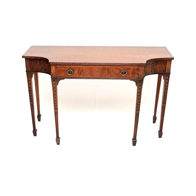 An outstanding antique Georgian period console table, made in England and dating from around the 1790-1810 period. The...