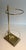 This elegant neoclassical-style umbrella stand is made of brass. It is a French work. Circa 1970