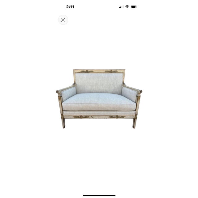 19th Century French Louis XVI Style Loveseat. Offered is a beautiful antique French Louis XVI style or French Empire style...