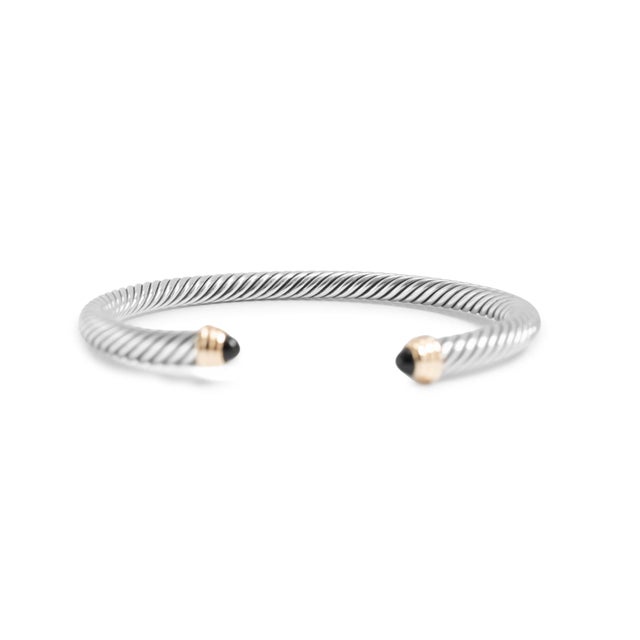 Brand: David Yurman Gender: Ladies Metal Type: 14K Yellow Gold & Silver Length: 6.50 inches Width: 5.00 mm Weight: 26.91...