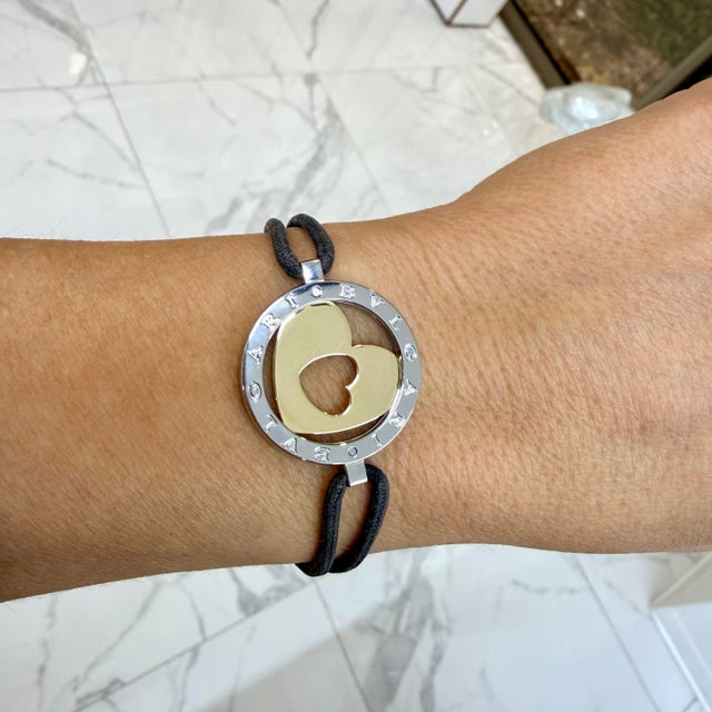 Brand: Bvlgari Gender: Ladies Metal Type: 18K Yellow Gold & Stainless Steel Length: 7.00 inches Diameter: 1.00 inches...