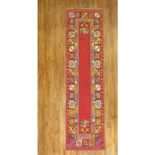 a mid 20th century bright turkish tulu runner Details rug no. 29249 size 2' 11" x 10' 9" (89 x 328 cm) rug type Tulu