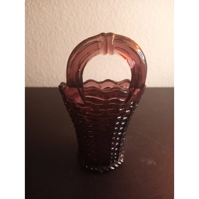 This is a Westmoreland Amethyst Glass Weave 6" Basket Vase Procured at auction BOX 2