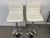 Design Plus Gallery presents a Pair of Bellatier Bar Stools from Ashley Furniture. These sleek and modern chrome-finished...
