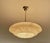 Large Art Deco pendant lamp featuring an ivory / light amber marble glass shade with darker veins, translucent ivory color...