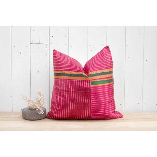 A beautiful Mashru silk lumbar pillow with a lovely embroidered tribal border of geometric and floral motifs. Mashru is...