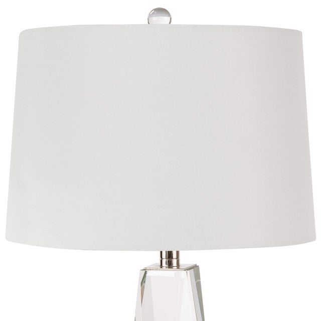 The Angelica Table Lamp is crafted of solid hand polished crystal, fitted with polished nickel hardware and topped with a...