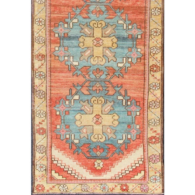 Colorful Antique Oushak Runner With Medallion Design in Terracotta, Yellow & Teal Blue For Sale - Image 4 of 9