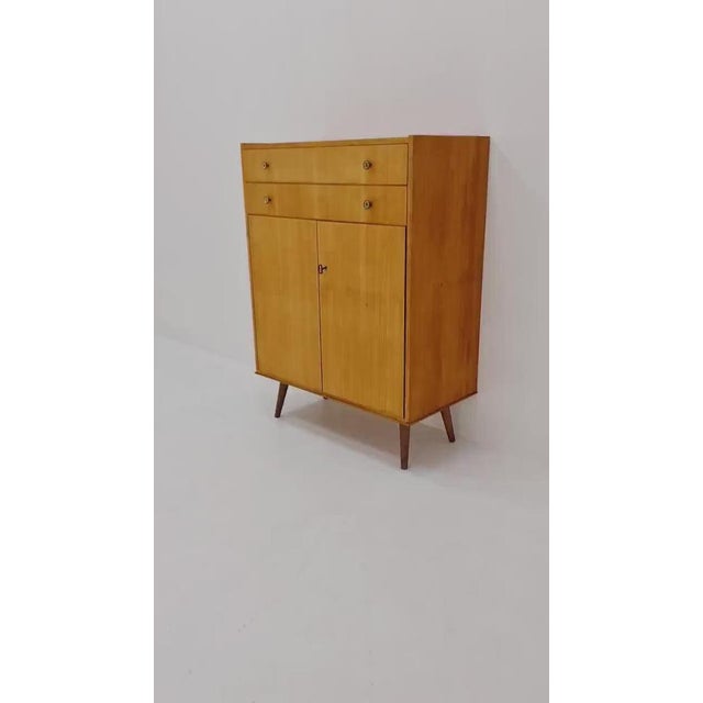 German Mid century sideboard cabinet by FLB Möbel , Germany 1960s The beautiful, materialistically designed cabinet is...