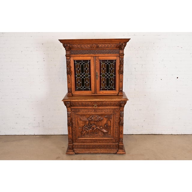A gorgeous antique French Renaissance Revival breakfront bookcase, cupboard, or bar cabinet In the manner of R.J. Horner &...