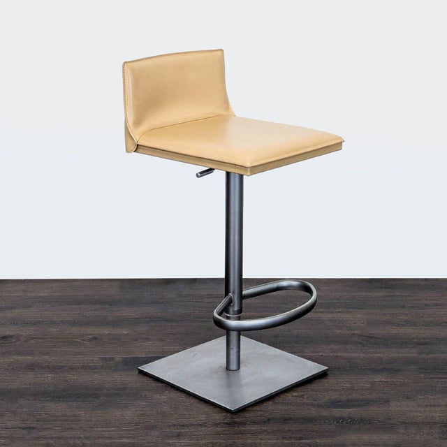 Handmade Italian stool with leather seat. Brand: Frag. Dimensions (in): 17W x 19D x 34H.