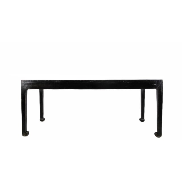 This antique Chinese black table was crafted with precision and elegance in early 19th century in China. This table...