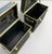 Pair of vintage Meek's leather campaign luggage trunks. These storage tables are black in color, standing at a height of...