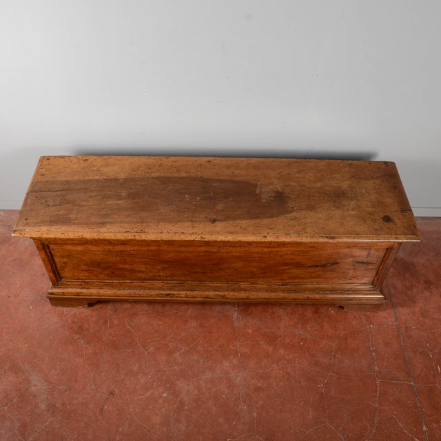 This large vintage walnut chest is an example of classic furniture with timeless charm. Its simple lines and balanced...