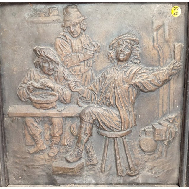 An exceptional pair of late 19th to early 20th century Continental cabinet doors featuring six richly detailed repoussé...