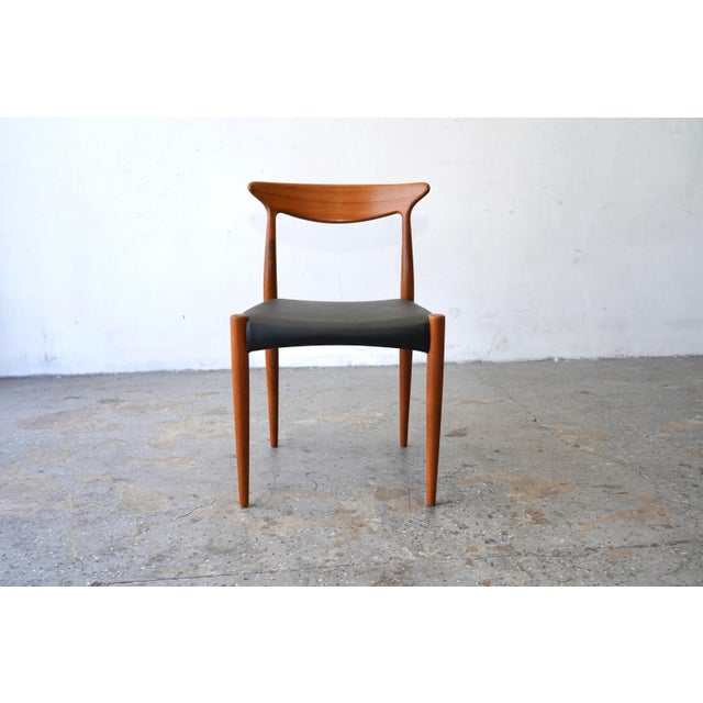 Beautiful set of three vintage Danish modern teak dining chairs, designed by Arne Hovmand-Olsen and produced by Mogens...