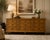 A beautifully crafted 1970s dresser by Mastercraft Furniture, showcasing the brand’s signature use of richly figured...