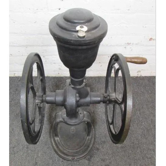 Large iron grinder for coffee stamped with Coles Mfg Co from Philadelphia PA. Makes a great statement piece in a large...
