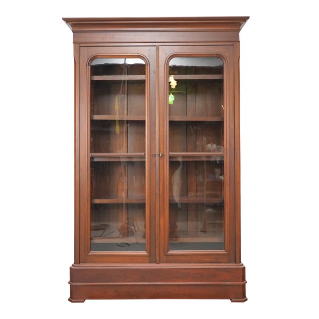 Late 20th Century Traditional Walnut Glass Front Double Door Bookcase Cabinet For Sale