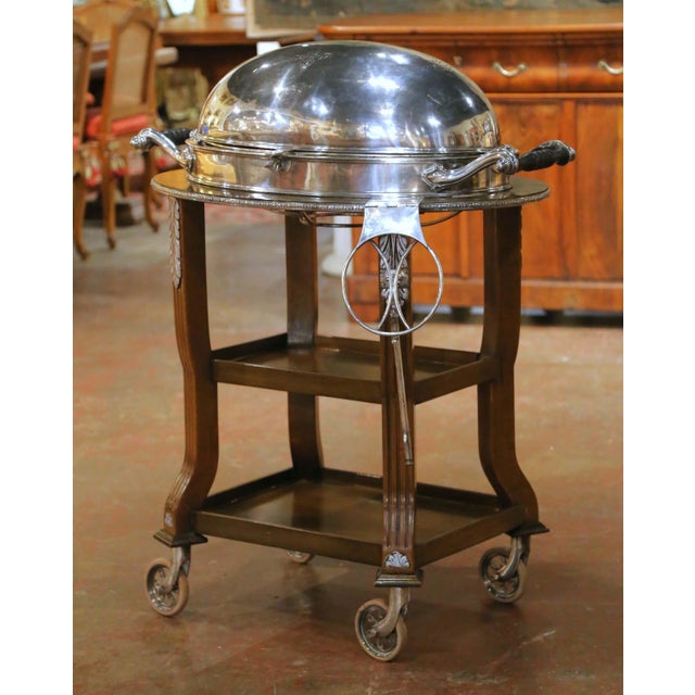 This impressive antique roast beef trolley combines elegant presentation with the practical refinements of traditional...