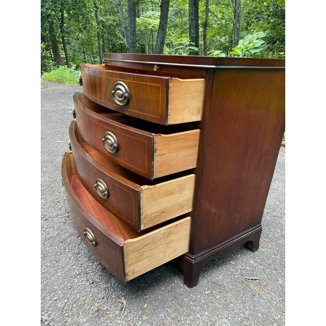 Late 20th Century Georgian-Style Bowfront Flame Mahogany Chest of Drawers by Baker Furniture. For Sale - Image 16 of 17
