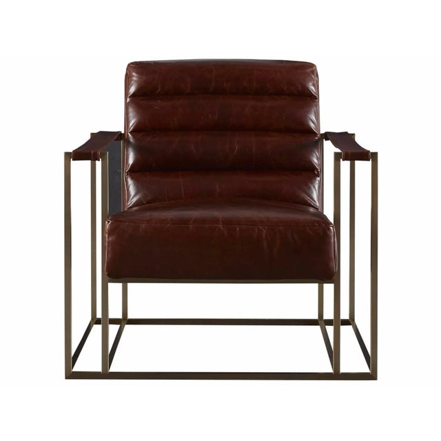 The Jensen accent chair in full top grain Brompton Brown Leather features an antiqued bronze metal frame and leather arms...