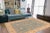 "Enhance the ambiance of your home with this magnificent Persian-influenced Turkish hand-knotted rug made by skilled...