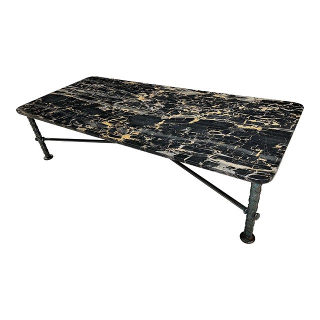Fine steel”rebar” coffee table having thick rectangular slab of Italian Portoro marble serving as the top, polished steel...